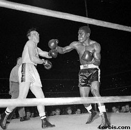 Gene Fullmer Grimaces Dick Tiger Punches, San 
Fransciso, California, October 23, 1962
